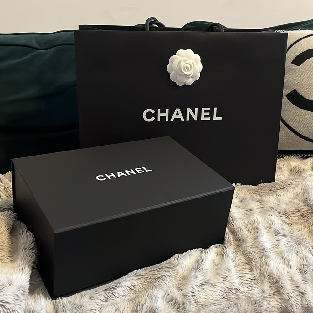 CHANEL Black Bag with White Accents
